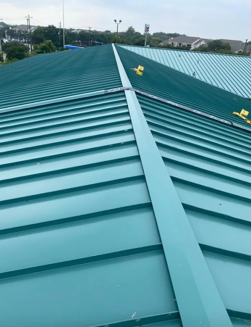 Green commercial metal roof ridge and valley for Metal Roof Repair in Windham
